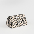 Leopard print cosmetic bag on a light gray background