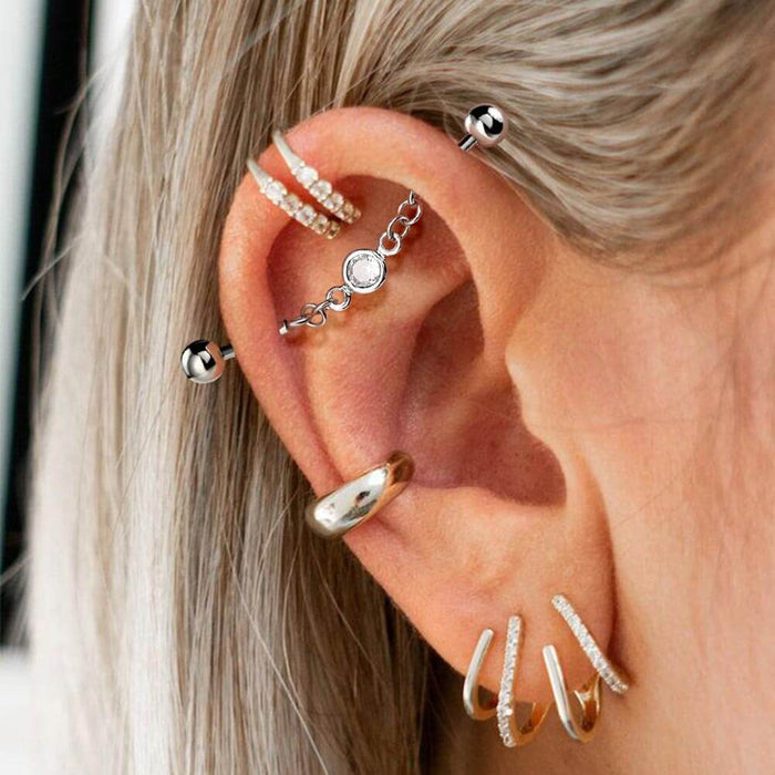 industrial barbell chain piercing