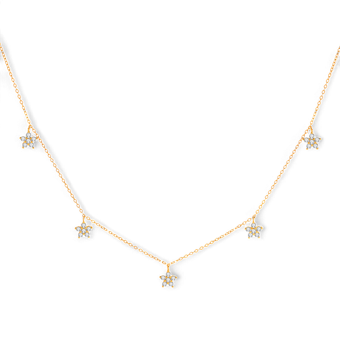 A gold necklace with small diamond-studded flower pendants on a dainty cable chain.