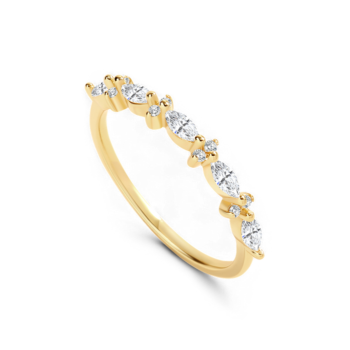 Gold ring with clear gemstones on a white background