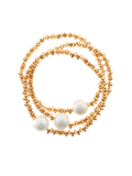 Bracelets (stack of 3)with white beads and beige stone-like beads on a white background