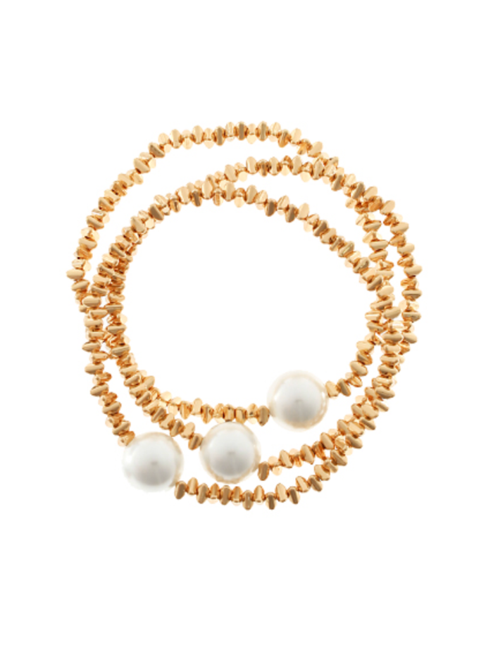 Bracelets (stack of 3)with white beads and beige stone-like beads on a white background