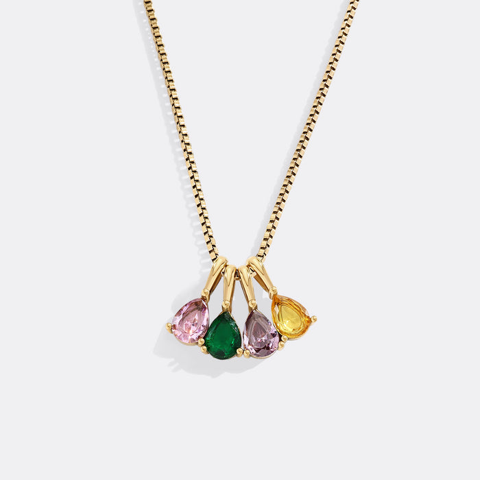 Necklace with multicolored gemstones on a white background
