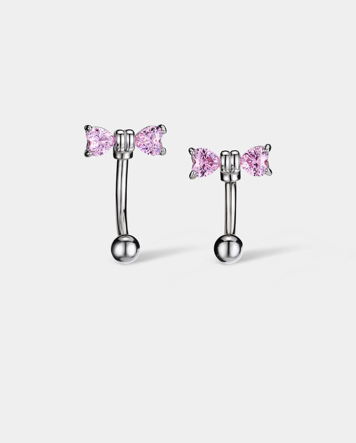 curved pink bow eyebrow piercing ring