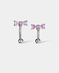 curved pink bow eyebrow piercing ring