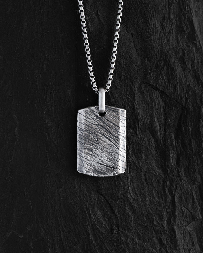 Silver dog tag SCAR