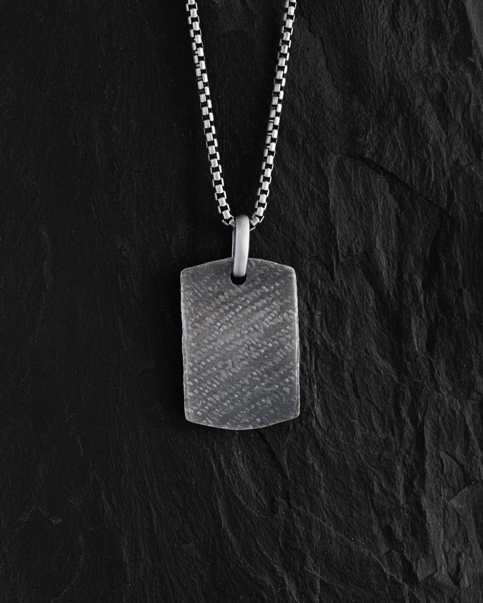 Silver dog tag SCAR