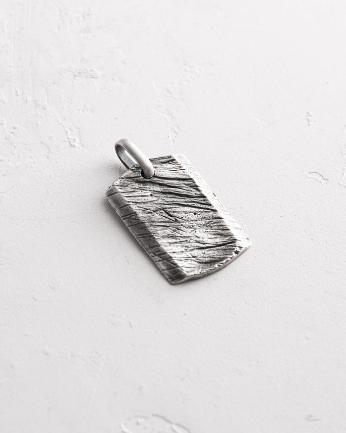 Silver dog tag SCAR
