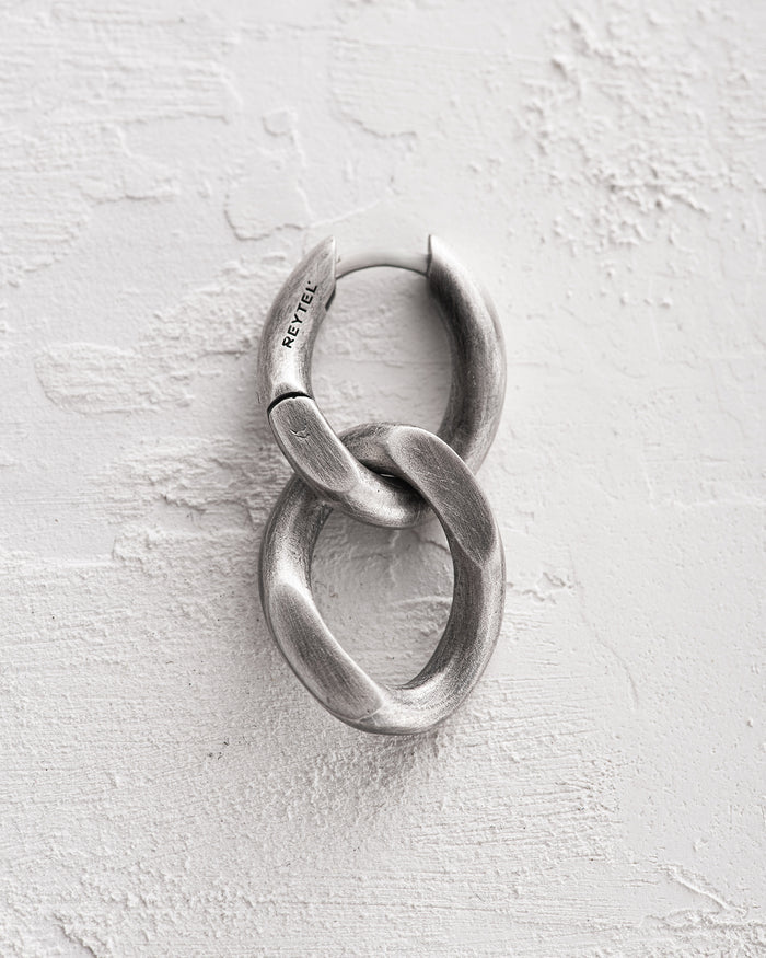 Silver monoearring DUAL