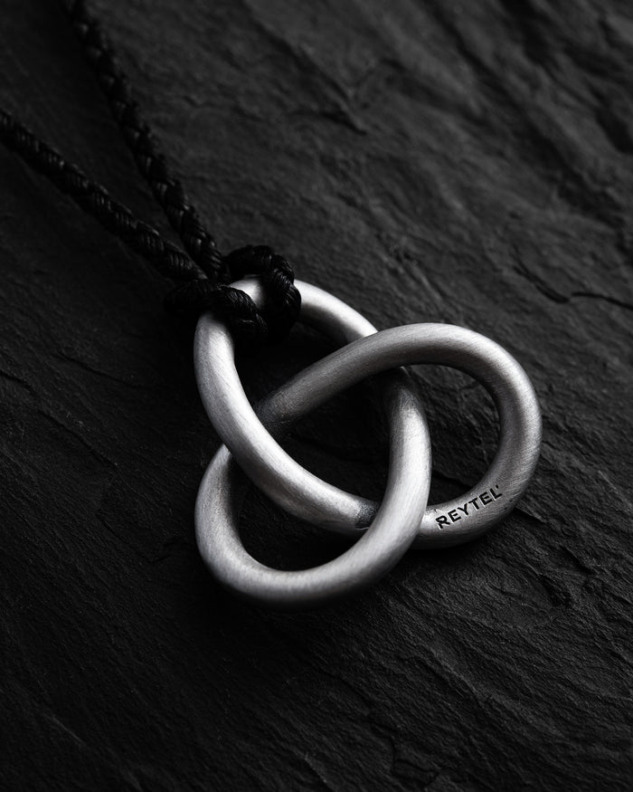 Silver pendant TRINITY (on a cord)