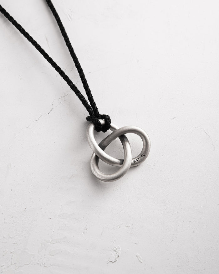 Silver pendant TRINITY (on a cord)