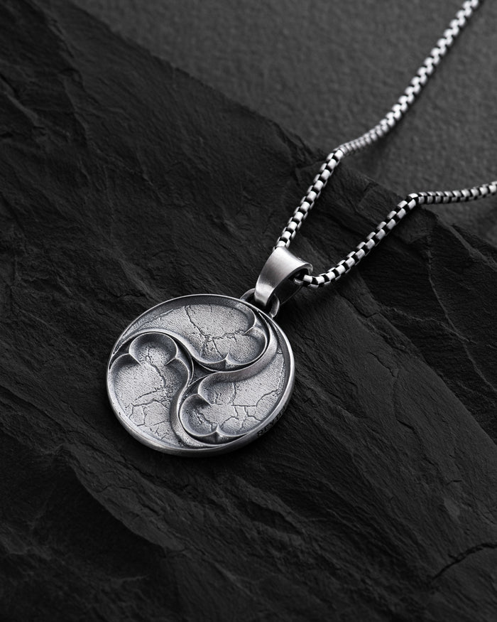 Silver pendant TRISKELION
