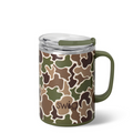 A handled insulated travel mug with a clear lid, featuring an all-over camouflage pattern in olive green, brown, tan, and dark brown. The brand name 'swig' is printed in brown near the bottom center.