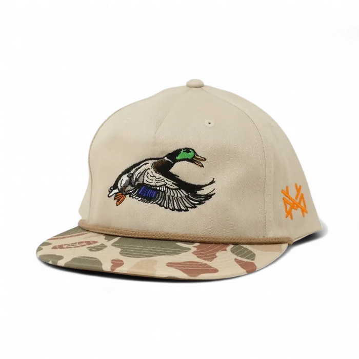 Beige cap with duck logo and camouflage brim on a white background