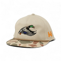Beige cap with duck logo and camouflage brim on a white background