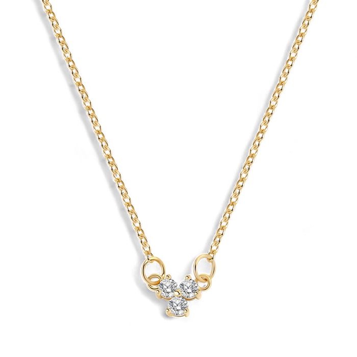 A gold pendant necklace with a trinity design featuring three diamond-like stones at the center, displayed on a black background.